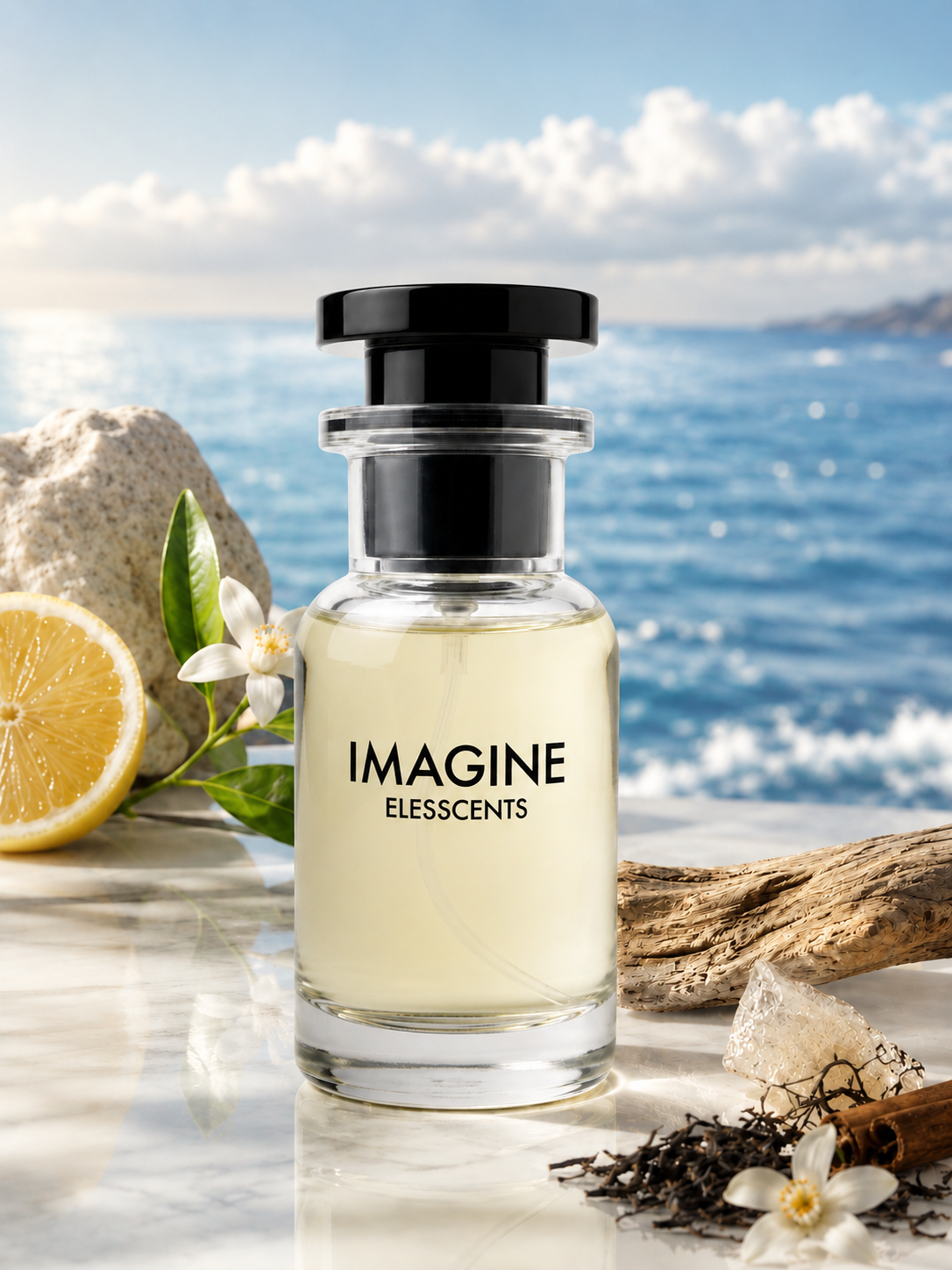Perfume bottle labeled 'Imagine Elesscents' with a scenic background of water and rocks.