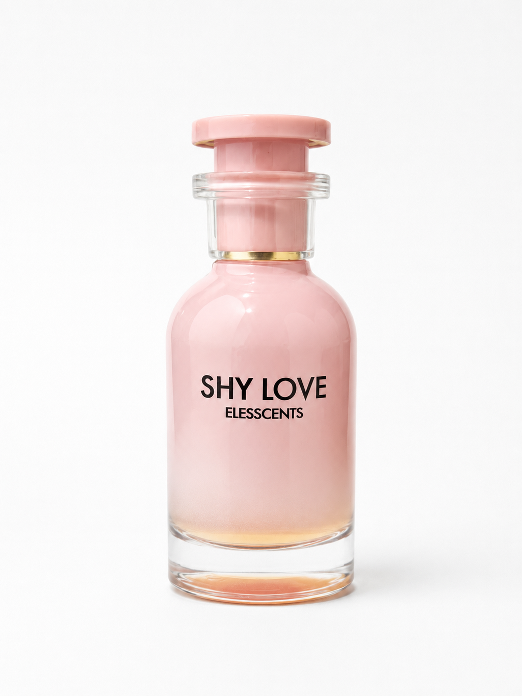 Pink perfume bottle labeled 'SHY LOVE' by Elesscents on a white background